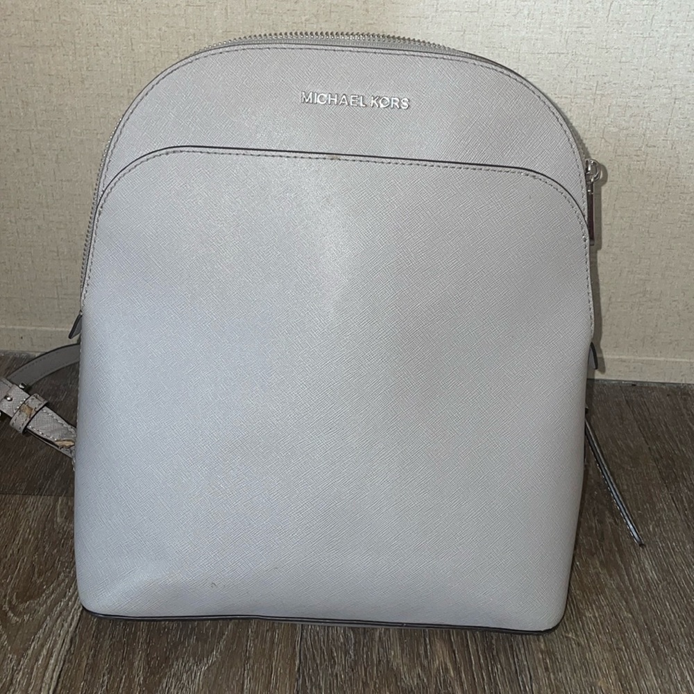 Michael Kors, gray backpack, clean, small flaw on handle